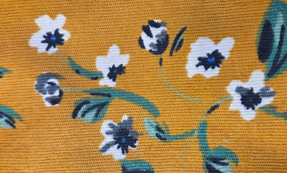 Mustard floral backpack – fabric close-up