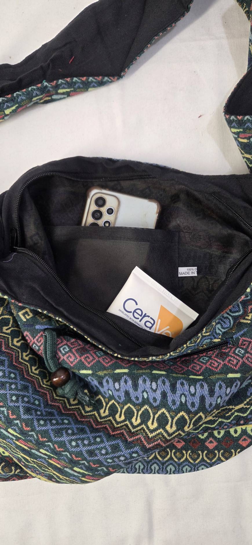 Thai woven shoulder bag BC-06 - interior view with phone and pocket