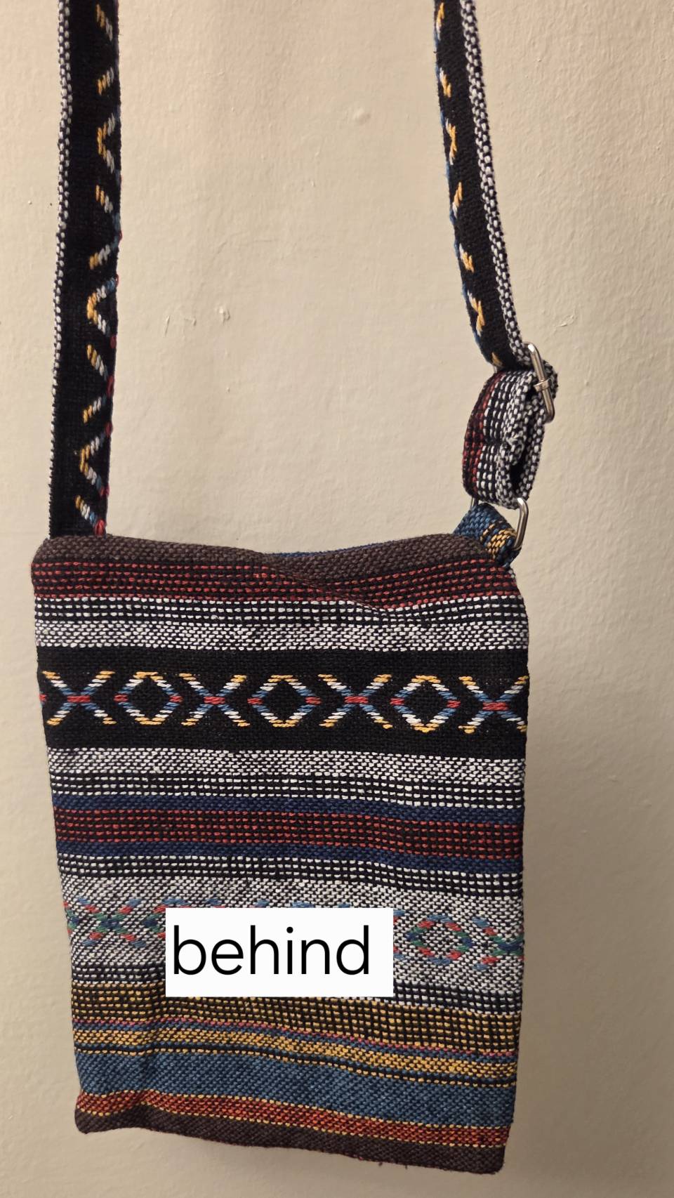 Thai woven crossbody bag front view showing 2 zippered pockets