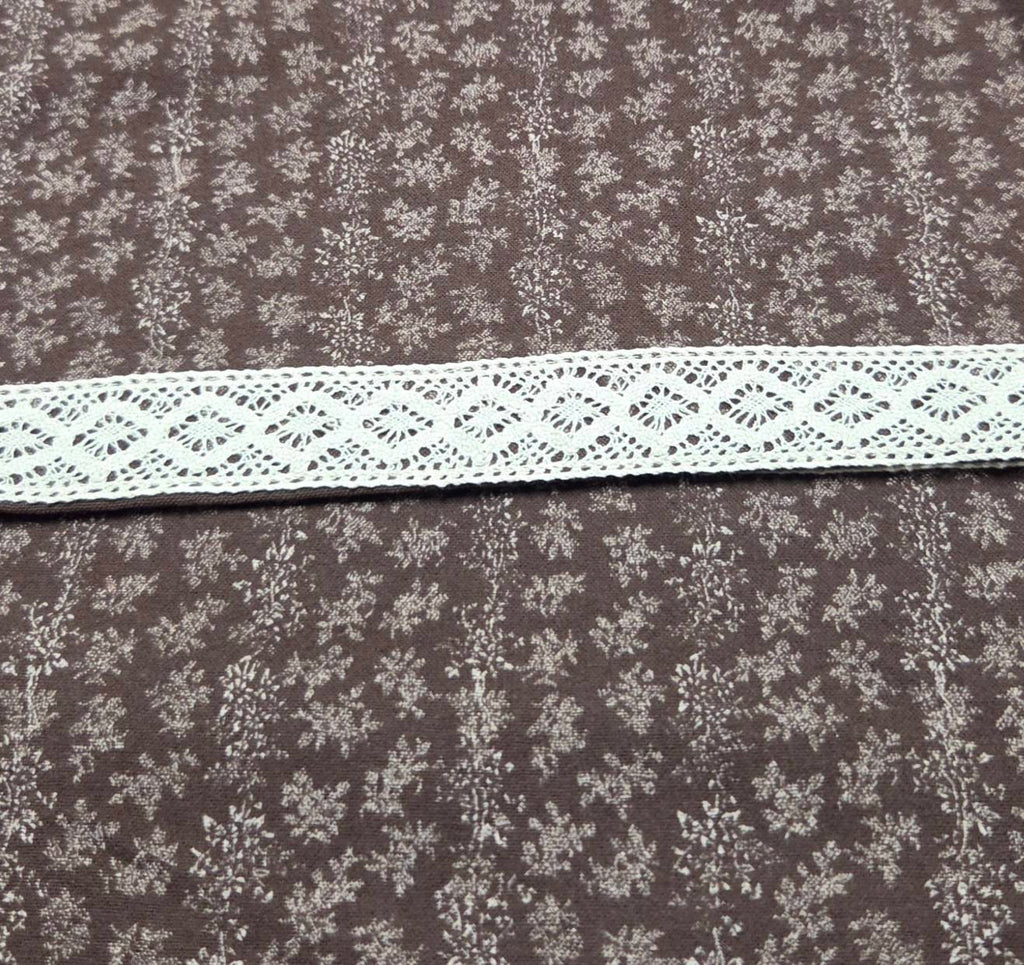 Close-up of cream decorative trim on LP-02 pajama pants