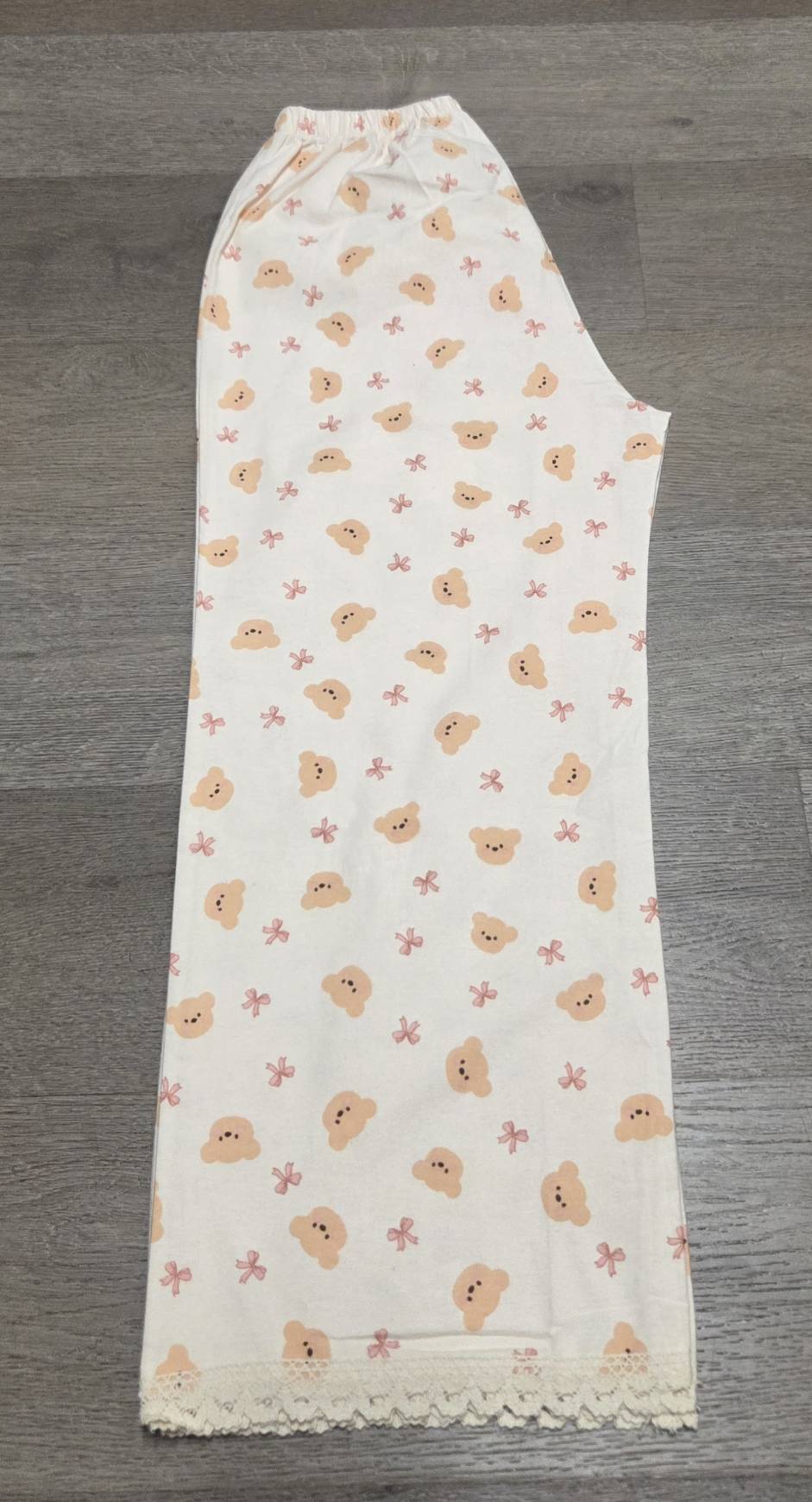 Side view of LP-05 ivory teddy bear straight-leg pajama pants