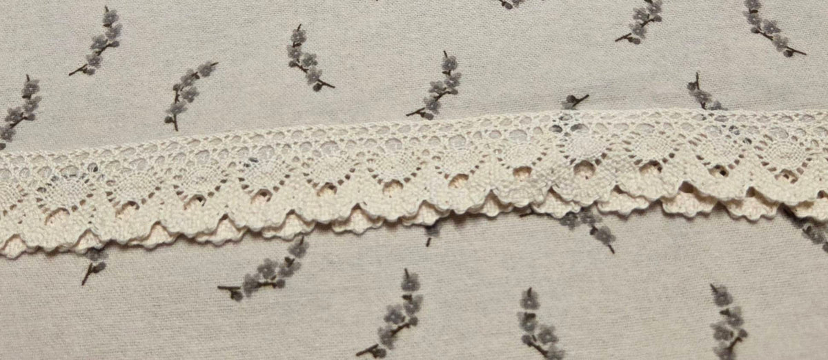 Front and back construction detail of LP-08 ivory botanical pajama pants