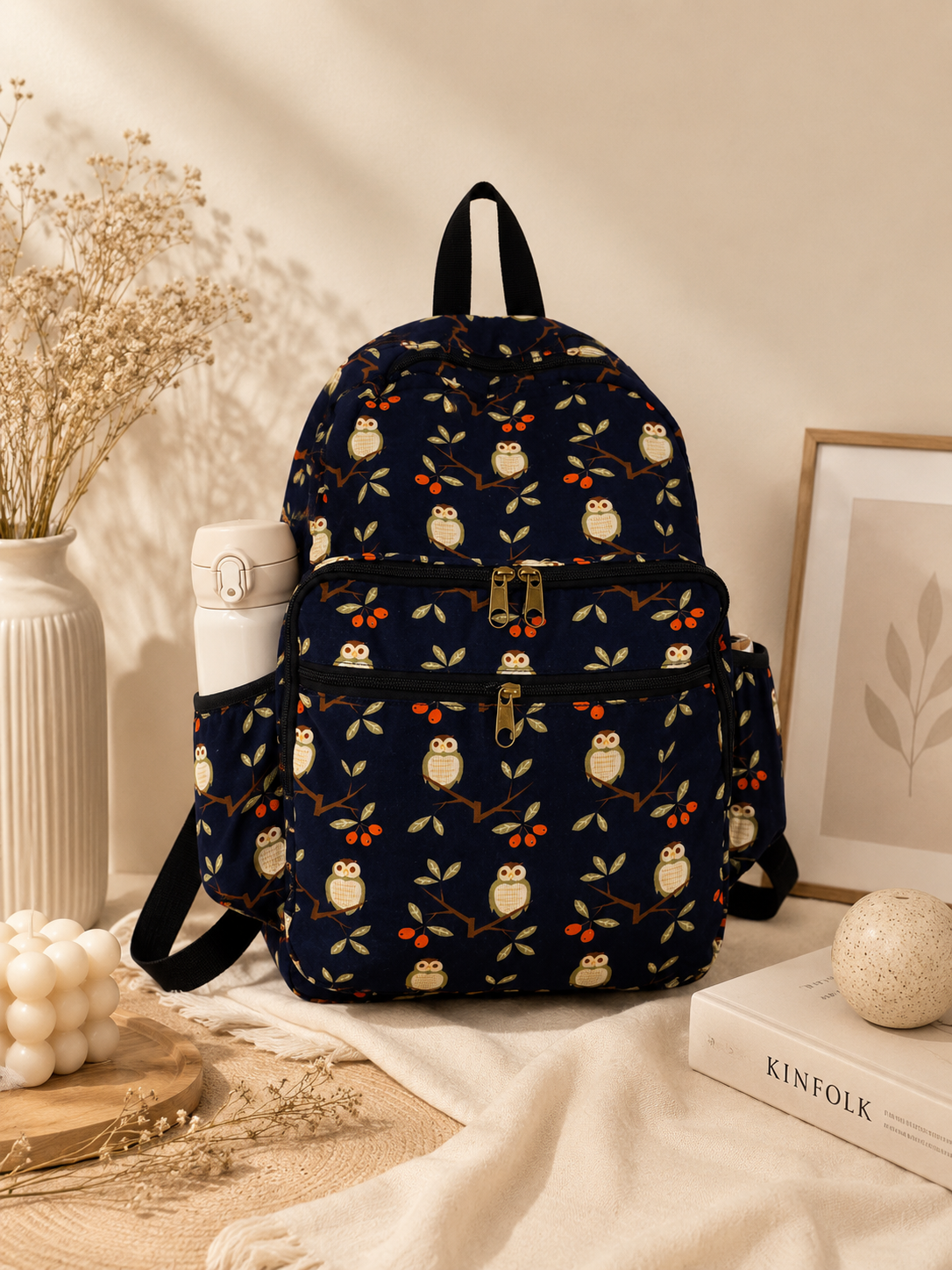Navy owl print backpack – AI product shot